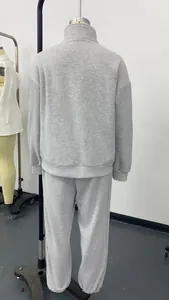 Back view of a grey fashion zipper collar solid color leisure two-piece outfit set