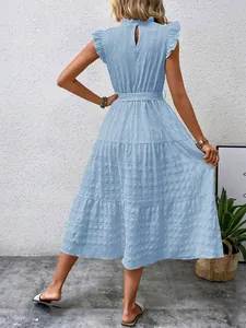 Back view of a light blue textured dress with ruffle sleeves and a belted waist