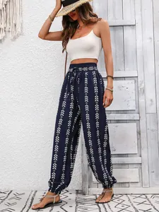 Stylish navy blue patterned high-waist harem pants for women in a summer boho style