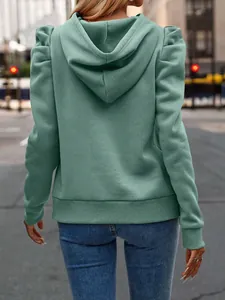 Detailed back view of a stylish sage green hooded sweatshirt featuring feminine puff sleeves
