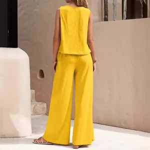 Vibrant yellow two-piece summer cotton set with sleeveless top and wide-leg pants