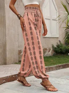 Detail of bohemian high waist lantern pants with ethnic geometric print for summer