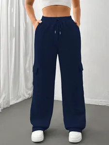 Full front view of navy blue wide-leg cargo sweatpants featuring side flap pockets