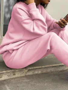 Women's pink oversized two-piece tracksuit set for autumn street style fashion