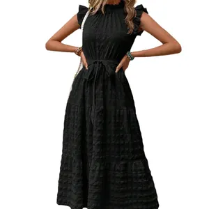 Elegant black textured maxi dress with ruffle sleeves and a tied waist for summer.