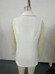 Detailed back view of a minimalist white sleeveless blazer vest for women on mannequin