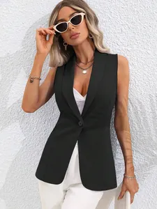 Fashionable women's black sleeveless blazer with single button detail on model