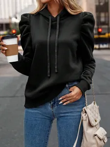 Detail view of black puff sleeve hooded sweatshirt for women casual street style