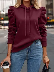 Fashionable burgundy puff sleeve hoodie with drawstring for women in urban street style
