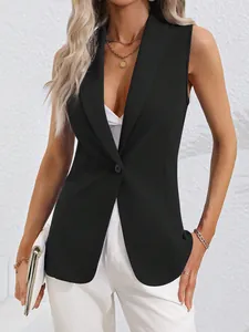 Detailed view of a woman's black sleeveless blazer vest with single-button closure.