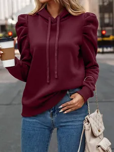 Stylish burgundy women's hoodie with distinctive pleated puff sleeves and drawstring hood