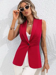 Detail shot of a stylish vibrant red sleeveless blazer vest with single button closure