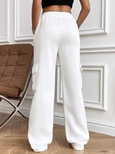 Stylish white wide-leg cargo sweatpants featuring elastic waist and side flap pockets