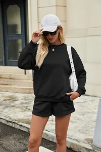 Women's black two-piece sweatshirt and pocket shorts set for casual outdoor wear