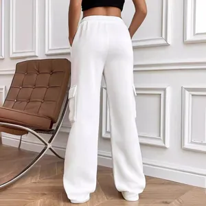 Women's white wide-leg cargo sweatpants with side pockets and elastic waist