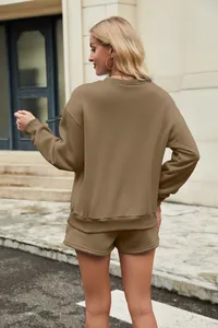 Back view of a casual brown long-sleeved sweatshirt and matching shorts set for women.