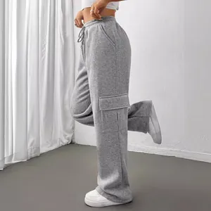 Stylish grey high-waisted wide-leg cargo sweatpants with side pockets for women wear