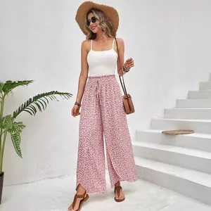 Stylish high waist floral wide leg pants with side slits for summer beach vacation