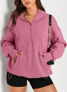 Close-up detail view of women's mauve half-zip hooded sweatshirt with kangaroo pocket