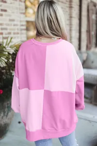Back view detail of pink checkered patchwork fleece sweatshirt for women