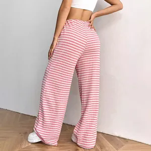 Pink and white striped wide-leg cotton pants for casual summer wear.