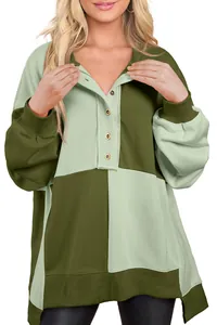 Close-up of casual color-block oversized sweatshirt with button-down lapel collar
