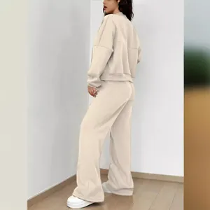 Élégant ensemble de survêtement beige pour femme avec pantalon large taille haute