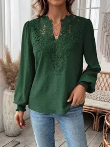 Elegant deep green long sleeve top featuring intricate V-neck lace details for women