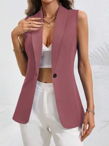 Detailed view of women's sleeveless mauve blazer vest with single button closure