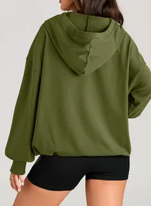 Back view of a comfortable olive green oversized drawstring hoodie for women