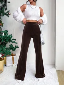 Brown high-waisted corduroy flare pants with vertical ribbed texture and wide leg design