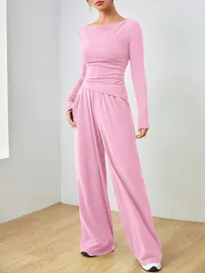Elegante completo rosa due pezzi da donna con top a maniche lunghe e pantaloni a gamba larga