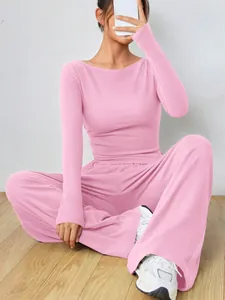 Elegante set due pezzi rosa da donna con top a maniche lunghe e pantaloni a gamba larga