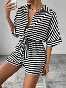 Stylish black and white striped button-down shirt and matching shorts set with waist tie