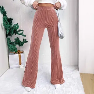 Elegant high-waisted ribbed corduroy flared trousers in dusty rose for autumn and winter
