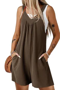 Detailed shot of brown waffle knit jumpsuit with deep V-neckline and functional side pockets