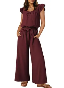 Close-up of women's burgundy square neck jumpsuit with ruffled sleeves and pockets