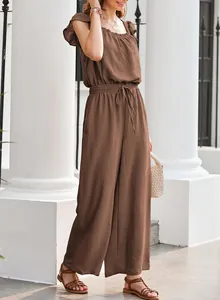 Brown pleated square neck jumpsuit featuring sleeveless design and drawstring waist details