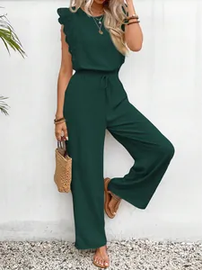 Elegantes dunkelgrünes Sommer-Set mit Spitzenbesatz und weiten Hosenbeinen für Damen