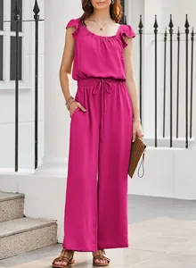Elegant fuchsia sleeveless jumpsuit featuring ruffled shoulders and a square neck.