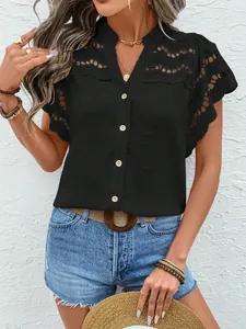 Detailed view of women's black lace hollow-out short sleeve button-up blouse top