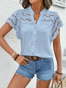 Detailed view of stylish women's light blue lace eyelet short sleeve button blouse