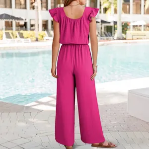 Elegant hot pink ruffle sleeve jumpsuit with wide legs shown from a back view.