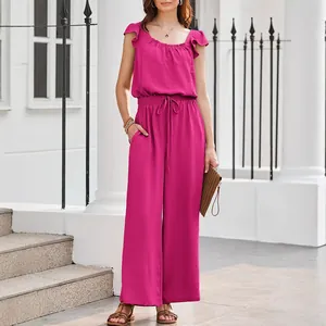 Vibrant fuchsia sleeveless pleated jumpsuit with flutter sleeves and side pockets for women