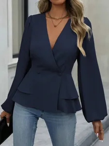 Elegante dunkelblaue Schößchenbluse im französischen Stil mit langen Ärmeln und Rüschen