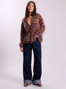 Close-up view of retro V-neck fuzzy cardigan with a multi-color shaggy knit texture