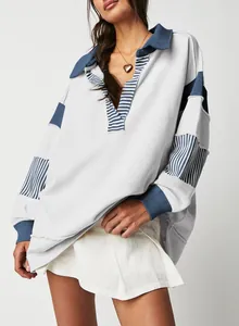 Oversized color-block striped sweatshirt with deep V-neck polo collar and raw seams