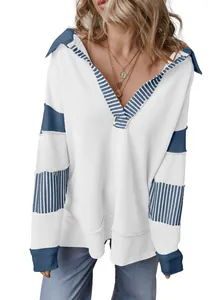 Close-up of elegant deep V-neck striped patchwork long sleeve sweatshirt fabric detail