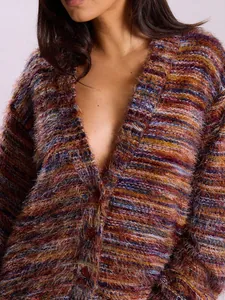 Detailed macro view showing the deep V-neck and colorful fuzzy knit texture of this vintage cardigan