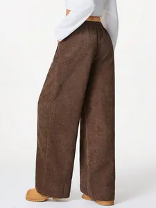 Detailed back view of brown corduroy high-waisted wide-leg trousers for a casual look